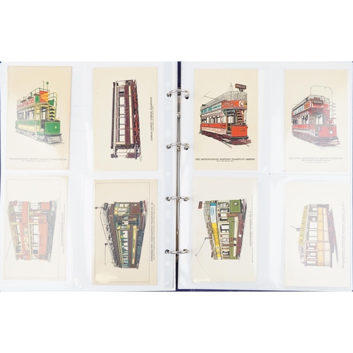 2265 - Two albums of reproduction colour postcards, predominantly of trams, together with a collection of l... 