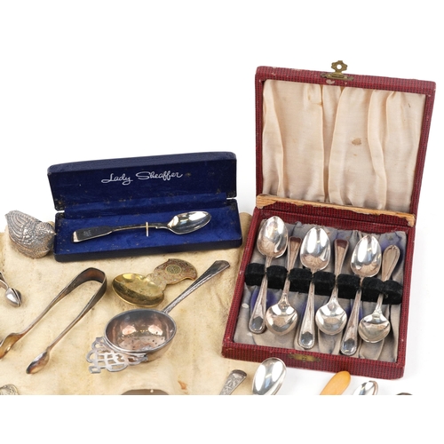 1070 - Victorian and later silver and silverplate including salad servers, straining spoon, trinket pots in... 