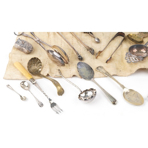 1070 - Victorian and later silver and silverplate including salad servers, straining spoon, trinket pots in... 