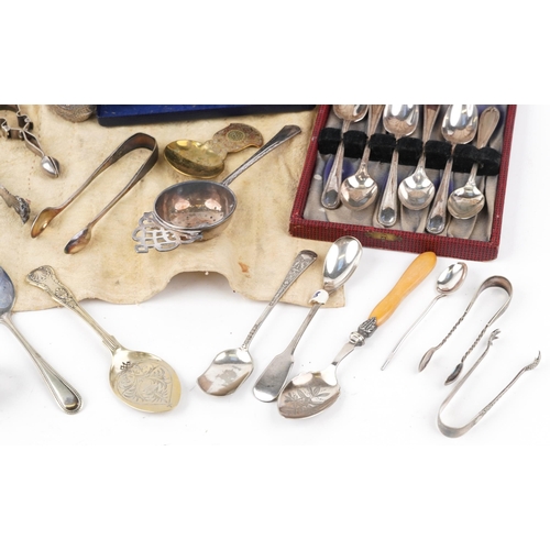 1070 - Victorian and later silver and silverplate including salad servers, straining spoon, trinket pots in... 