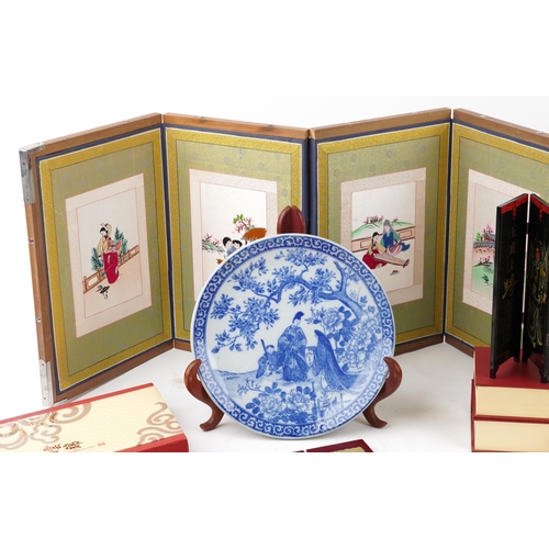 1119 - A group of Chinese and Japanese sundry items including embroidered table screens, lacquered table sc... 