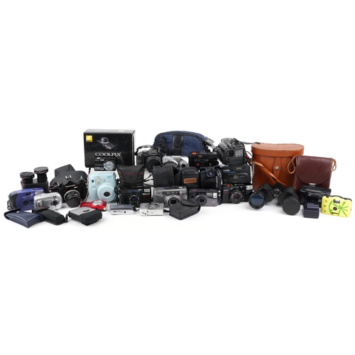 1012 - Vintage and later cameras, lenses, accessories and binoculars including Miranda REII, Panasonic Lumi... 