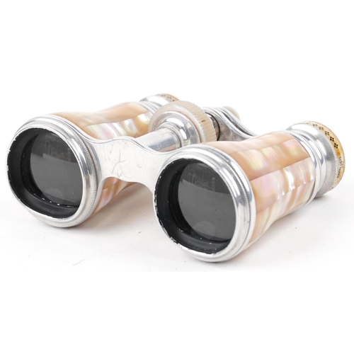 1006 - A pair of 20th century mother of pearl opera glasses with fitted case.