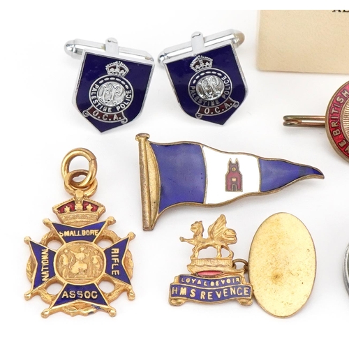 1096 - A group of military interest enamelled badges and medallions including British Red Cross Society, Na... 