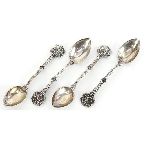 578 - A set of four 835 grade teaspoons with naturalistic terminals, 9cm in length, total 33.0g.