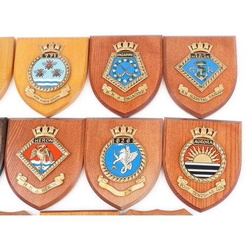 2500 - A collection of eleven naval interest shield shaped wall plaques including H.M.S. Heron, H.M.S . Eng... 