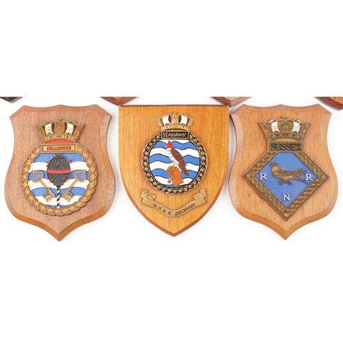 2500 - A collection of eleven naval interest shield shaped wall plaques including H.M.S. Heron, H.M.S . Eng... 