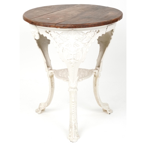 2020 - A late 19th century white painted cast iron pub table, the later circular top above pierced foliate ... 