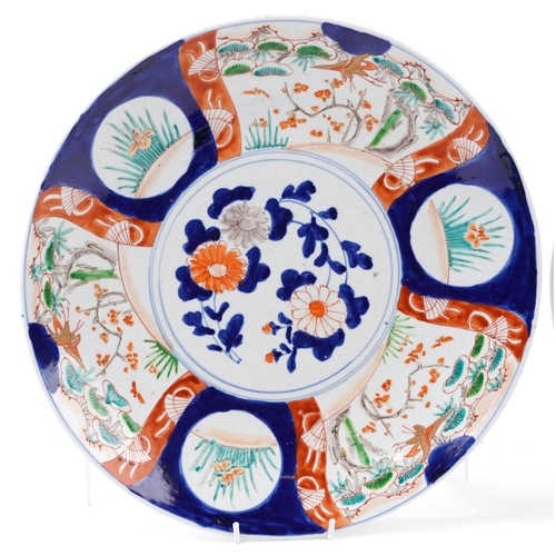 171 - Three Japanese Imari porcelain circular chargers, late 19th/early 20th century, each with hand paint... 