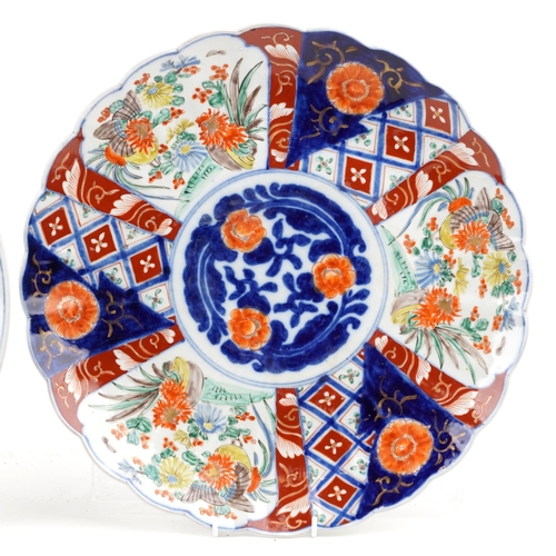 171 - Three Japanese Imari porcelain circular chargers, late 19th/early 20th century, each with hand paint... 