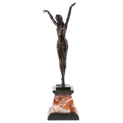 339 - A patinated bronze study of an Art Deco female dancer raised on a marble base, 56cm high.