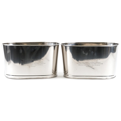 1034 - A pair of polished metal Champagne ice buckets with Napoleon Bonaparte and Lily Bollinger mottos, ea... 