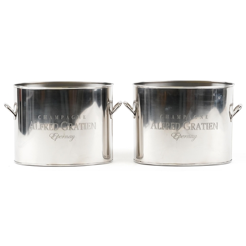 1035 - A pair of Alfred Gratien design Champagne ice buckets with twin handles, each 28cm wide.