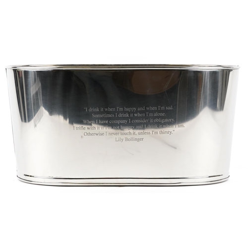 1033 - A large polished metal Champagne ice bucket with Napoleon Bonaparte and Lily Bollinger mottos, 31cm ... 