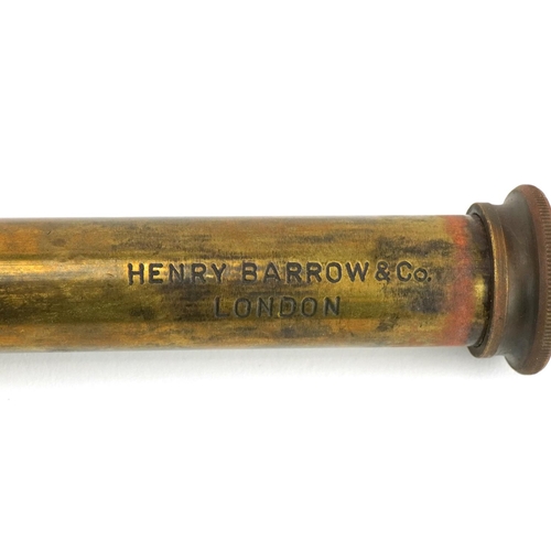 1098 - An early 20th century style brass and leather bound three draw telescope, detailed Henry Barrow & Co... 