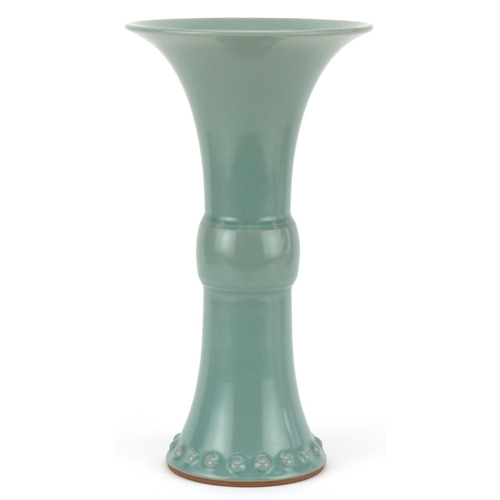 428 - A Chinese celadon glazed porcelain trumpet vase, modern, with flared rim and circular base, 35cm hig... 