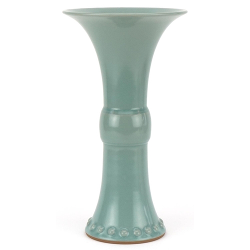 428 - A Chinese celadon glazed porcelain trumpet vase, modern, with flared rim and circular base, 35cm hig... 