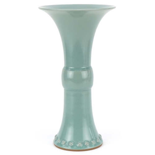 428 - A Chinese celadon glazed porcelain trumpet vase, modern, with flared rim and circular base, 35cm hig... 