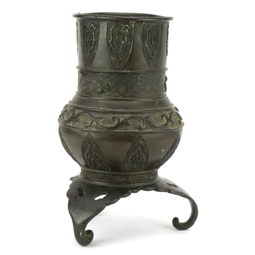 178 - A Chinese bronze archaistic style tripod censer, late 19th/early 20th century, decorated in relief, ... 