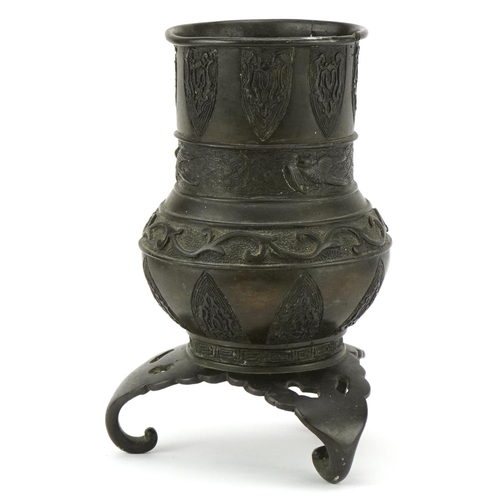 178 - A Chinese bronze archaistic style tripod censer, late 19th/early 20th century, decorated in relief, ... 