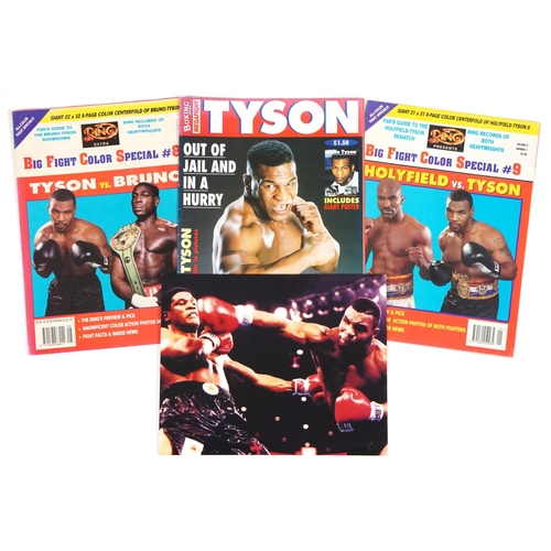 2306 - A small collection of sporting memorabilia relating to Mike Tyson including a colour advertising pos... 