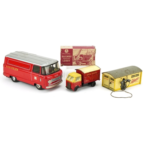 1331 - A mid 20th century Schuco tinplate garage, model number 1500, together with a Japanese tinplate post... 