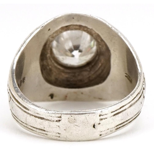 3132 - A silver 1950 college design ring set with a clear stone, London 1987, size Y, 15.4g.