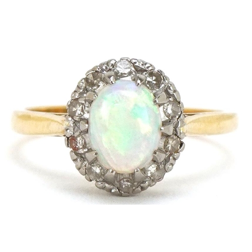 3085 - An 18ct gold cabochon opal and diamond ring, size L/M, 3.3g.