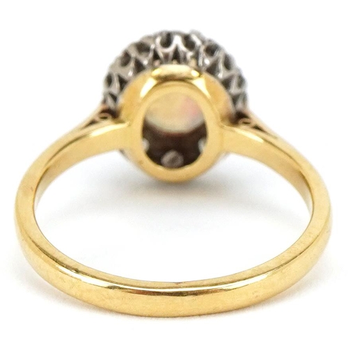 3085 - An 18ct gold cabochon opal and diamond ring, size L/M, 3.3g.