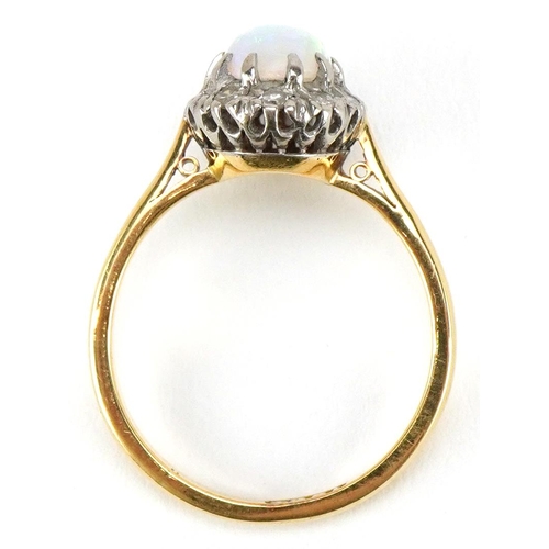 3085 - An 18ct gold cabochon opal and diamond ring, size L/M, 3.3g.