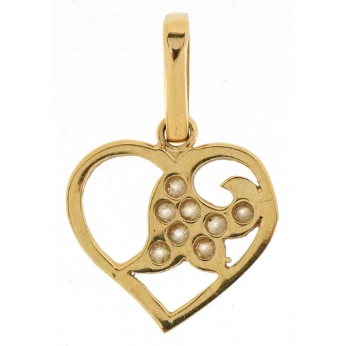 3415 - A 14ct gold love heart pendant set with clear stones, 2.2cm high, 1.3g.