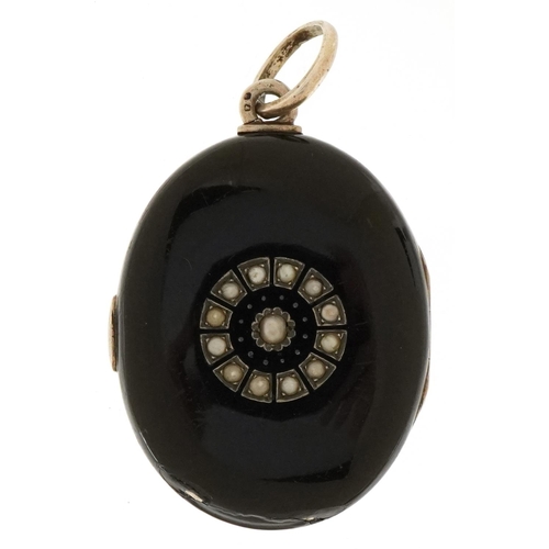 3491 - A Victorian black enamel and seed pearl mourning locket, 5.5cm high, 33.0g.