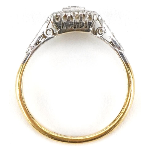 3030 - An Art Deco style 18ct gold and platinum diamond square cluster ring, size O/P, 3.5g, housed in a W ... 