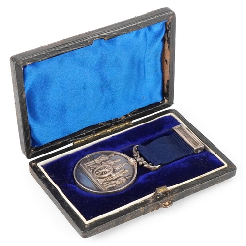 2403 - A military interest 2nd Norfolk Honorary Member Artillery Volunteers medal housed in a velvet and si... 