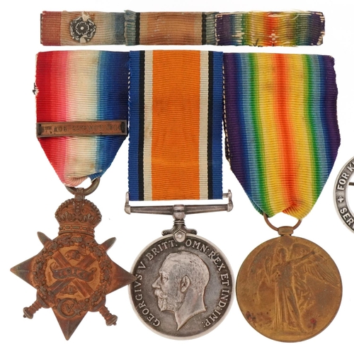 2383A - British military World War I medal trio and militaria, the trio awarded to L-7599 PTE.E.SPRIGGS.E.KE... 