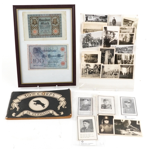 2442 - A collection of German militaria including World War II black and white photographs and death cards.