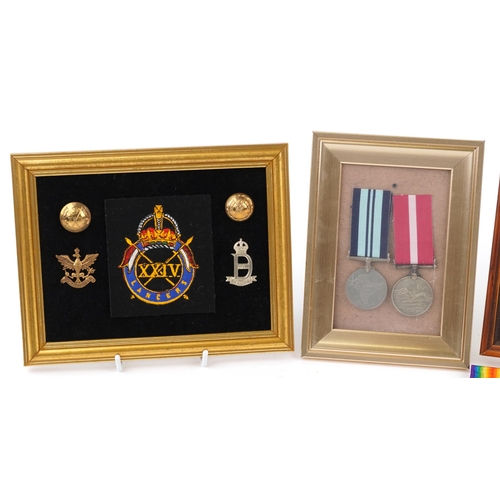 2433 - Militaria including World War II India General Service medal, World War II display of Lancer's cap b... 