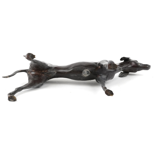 2 - A modern patinated bronze study of a Greyhound, 39cm in length.