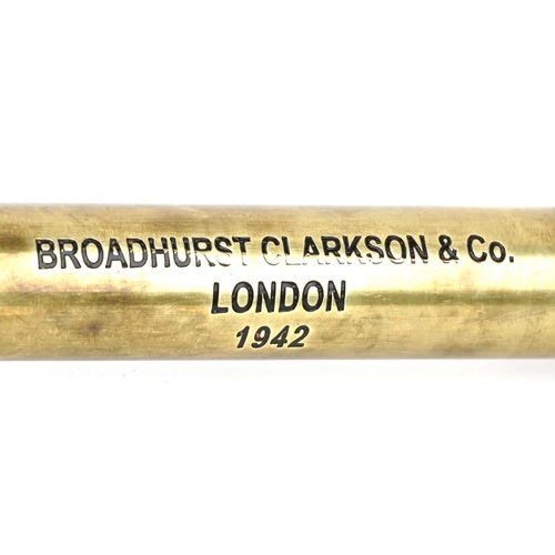 2439 - A brass three draw telescope, 62.5cm in length extended.