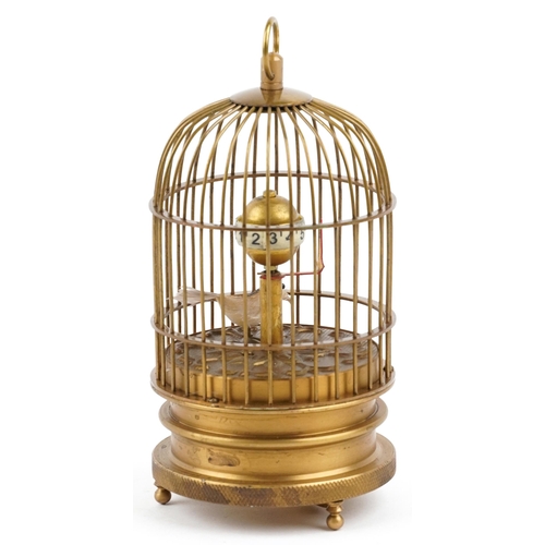 410 - A late 20th century clockwork automaton birdcage musical clock, 15.5cm high.