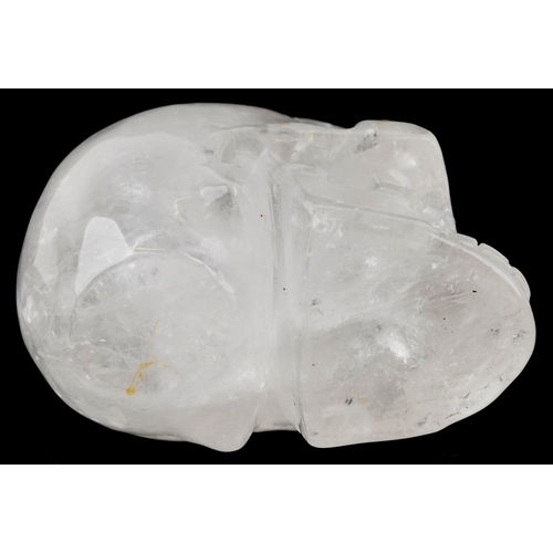 1116 - A novelty carved rock crystal model of a human skull, 11cm in length.