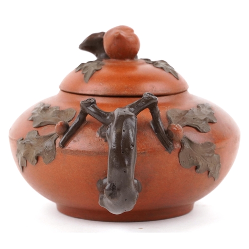 418 - A Chinese Yixing stoneware teapot, 20th century, with naturalistic decoration, 20cm in length.