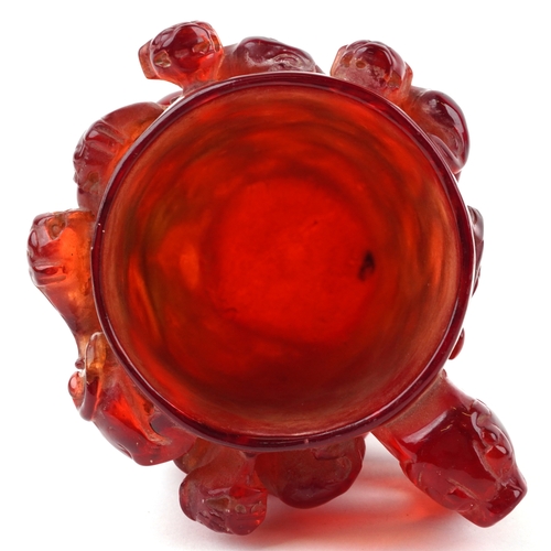 402 - A Chinese carved cherry amber libation cup, 20th century, relief decorated with dragons, H-13cm, 558... 