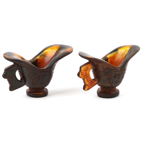 400 - A pair of Chinese carved horn libation cups, 20th century, with incised decoration, H-6cm x W-9cm.