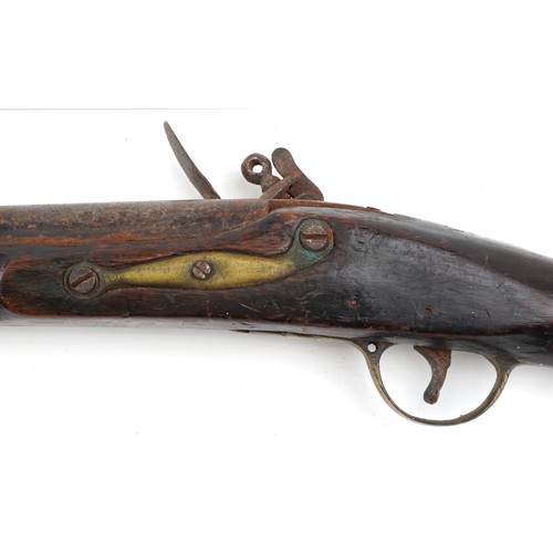 2552 - A 19th century Tower British military flintlock rifle with brass mounts, impressed proof marks, 144c... 