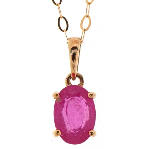 3114 - A 9ct gold pink sapphire solitaire pendant on a 9ct gold necklace, 13mm high and 44cm in length, tot... 