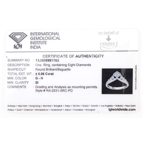 3102 - A Palladium diamond set ring with certificate, total diamond weight approximately 0.06 carat, size L... 