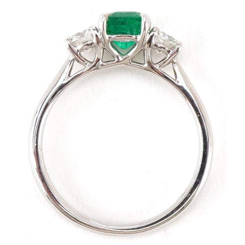 3408 - An 18ct white gold emerald and diamond trilogy ring, the emerald weight approximately 0.66 carat, to... 