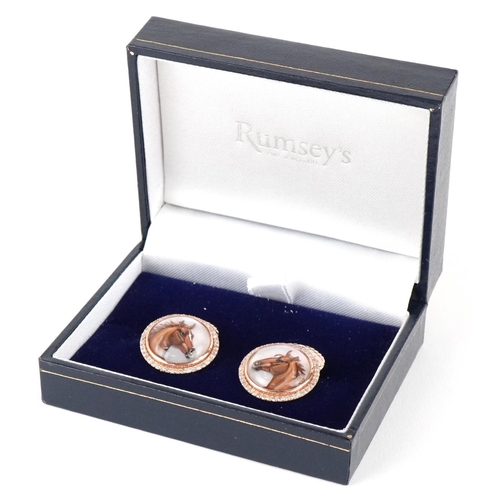 3162 - A pair of 14ct rose gold and diamond Essex crystal design cufflinks decorated with horse heads, each... 