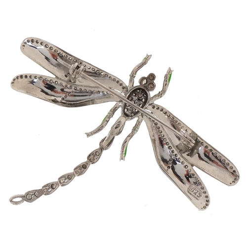 3041 - A silver and enamel brooch set with diamonds in the form of a dragonfly, total diamond weight approx... 